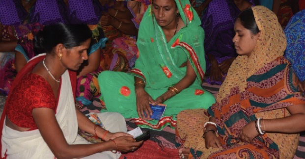 An Anganwadi Worker registering pregnant women as BCSP beneficiaries