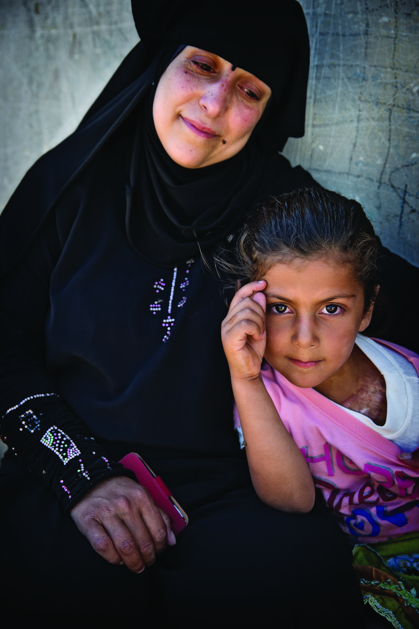A Syrian woman and her niece in a refugee camp in Jordan