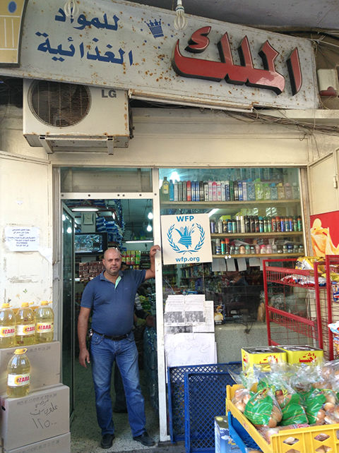 Shopkeeper in a participating shop