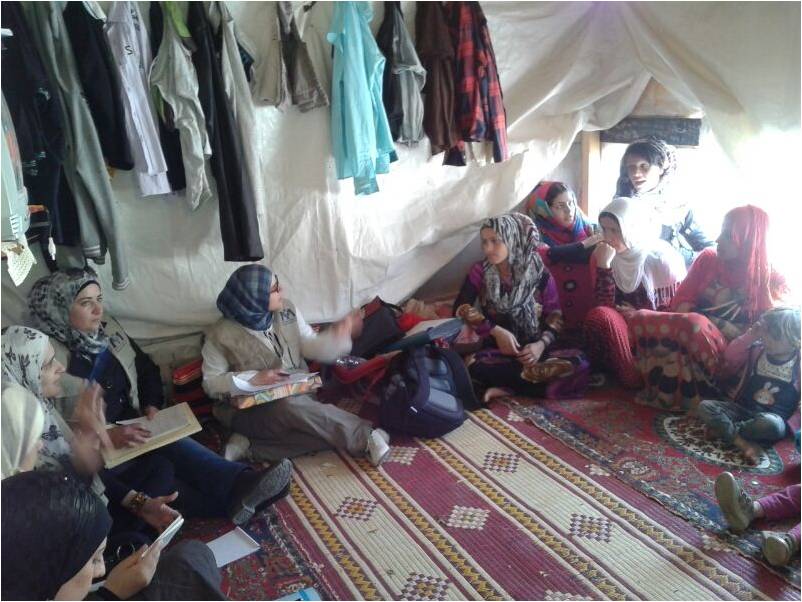 A community health worker gives a health awareness session in the Bekaa region