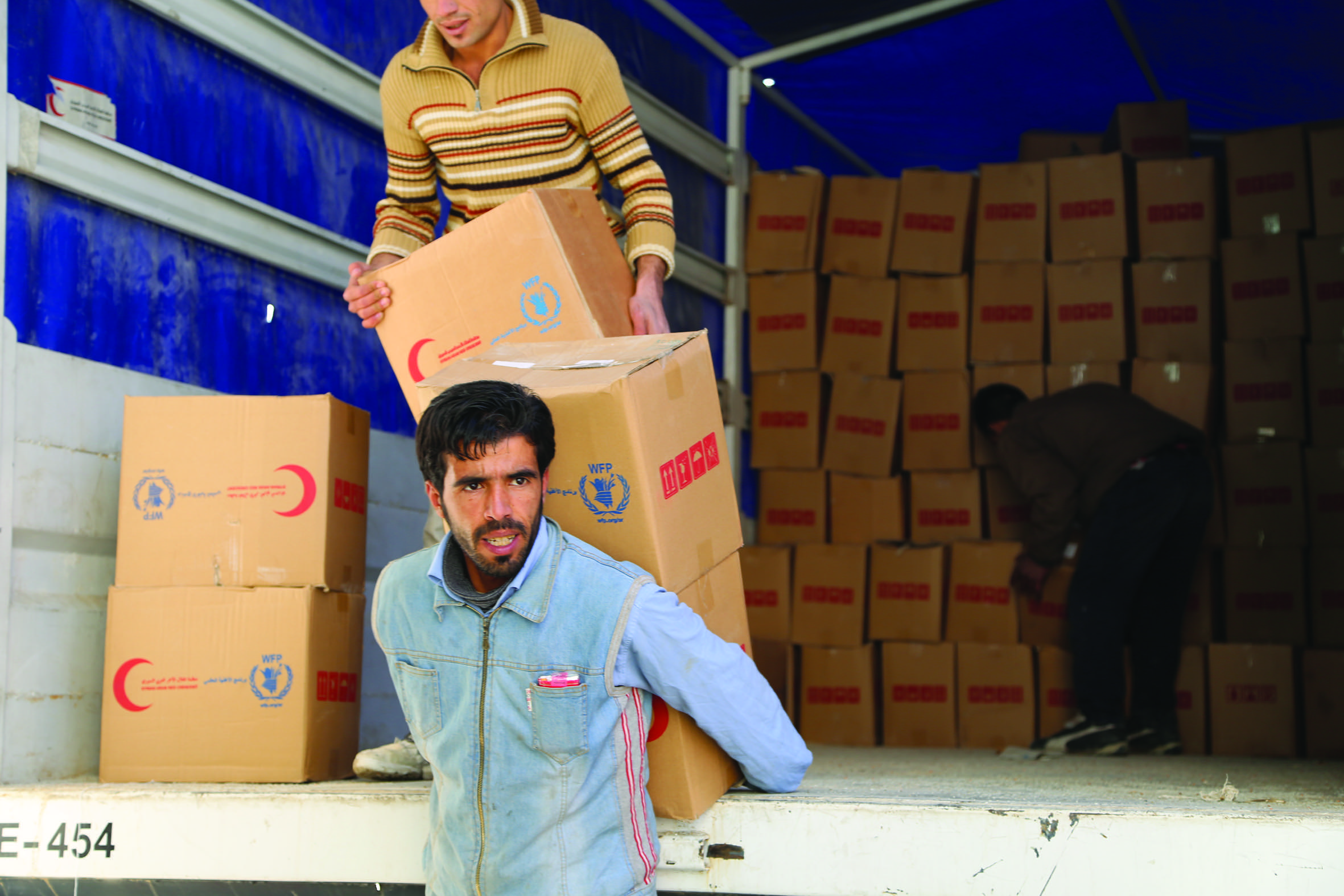 SARC volunteers at a distribution centre in rural Damascus