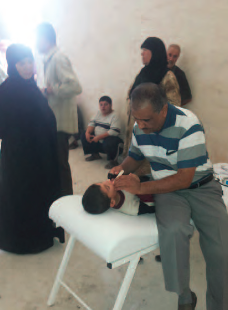 Medical examination at a primary health centre in Aleppo governorate