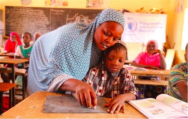A girl and her teacher in a school in Simiri, Niger, 2017