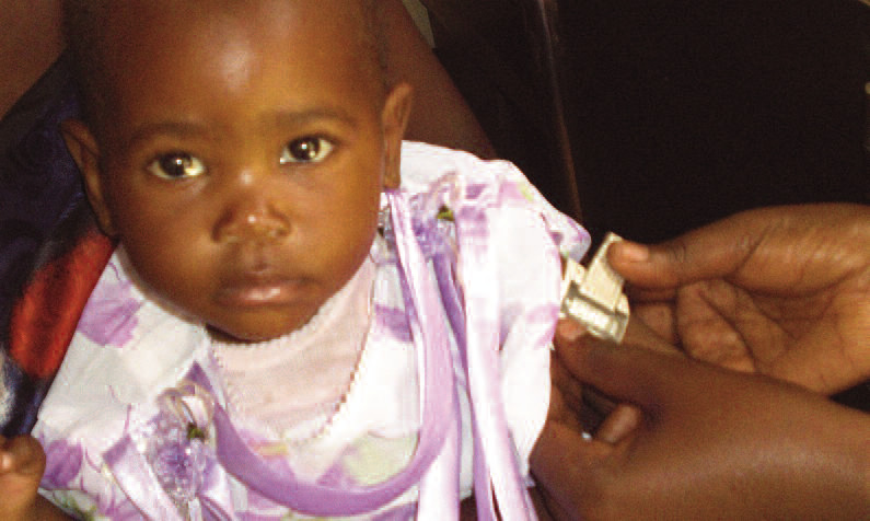 A young child being assessed for admission to the Zambia programme