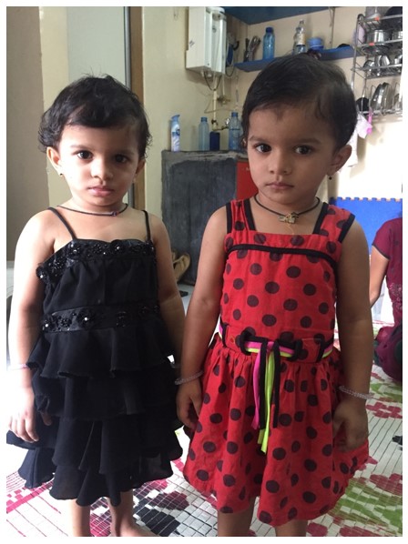 18-month-old twin girls who were admitted to the programme at two months of age and who had reversal of stunting by 27 months of age