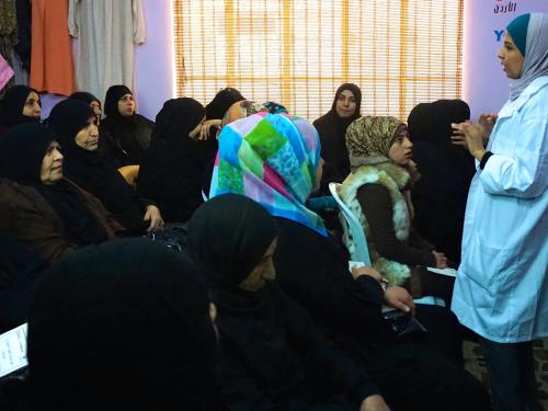 FB a health educator leads an awareness session for women