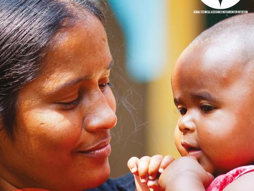 Front cover of report titled, "Baseline Technical Needs Assessment Report 2019." The image shows a mother holding her baby.