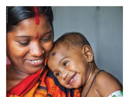 Front cover of report titled, "Wasting in the wider context of undernutrition - An ENN Position Paper" from June 2020. It shows mother and smiling infant.