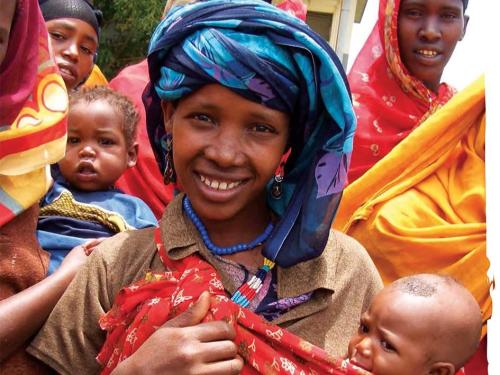 Front cover titled, "Special 40th issue: focus on Ethiopia." The image shows a group of Ethiopian mothers with their babies.