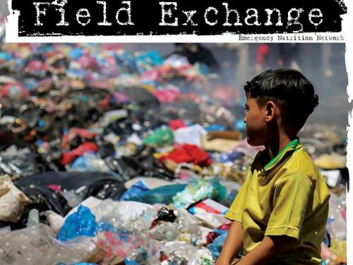 Front cover image shows a boy looking out over rubbish dump.