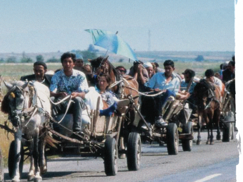 Front cover image shows people traveling by horse and cart 