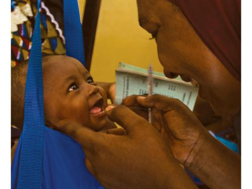 Front cover of report titled, "Meeting Report: Management of Acute Malnutrition in Infants under 6 months (MAMI) Interest Group Meeting." Image shows a baby being weighed.