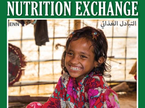 Front cover of Nutrition Exchange Arabic version of issue 10. Image shows a young girl eating from bowl and smiling.