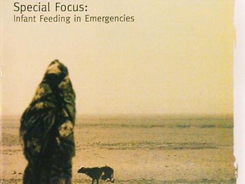 Front cover of issue titled, "Special focus: Infant Feeding in Emergencies." Image shows a woman walking across a wasteland with a goat
