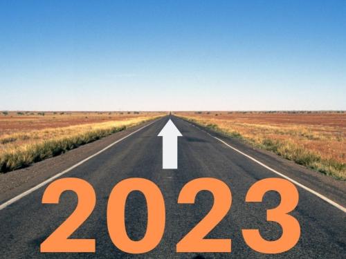 An empty road with 2023 at the beginning and an arrow 