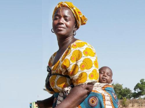 Woman with baby on her back