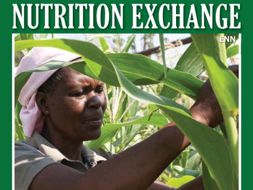 Front Cover of Nutrition Exchange Journal Issue 5 showing the face of a woman in a crop field
