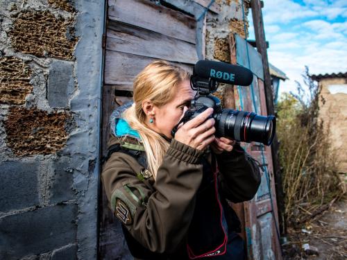 A woman with a professional camera in Ukraine