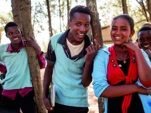 A group of adolescents in a forest