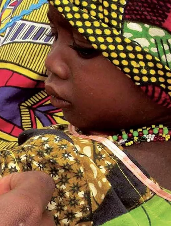 Front cover image shows a baby's arm being measured