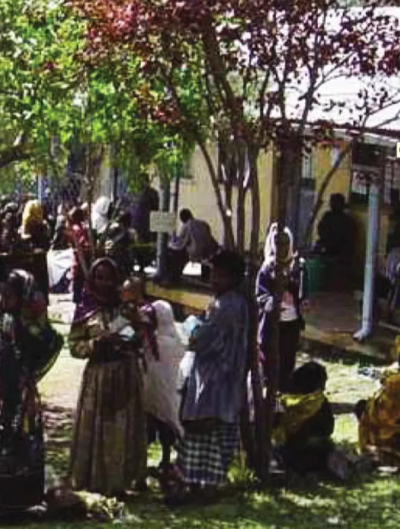 Front cover image shows people entering and leaving clinic building