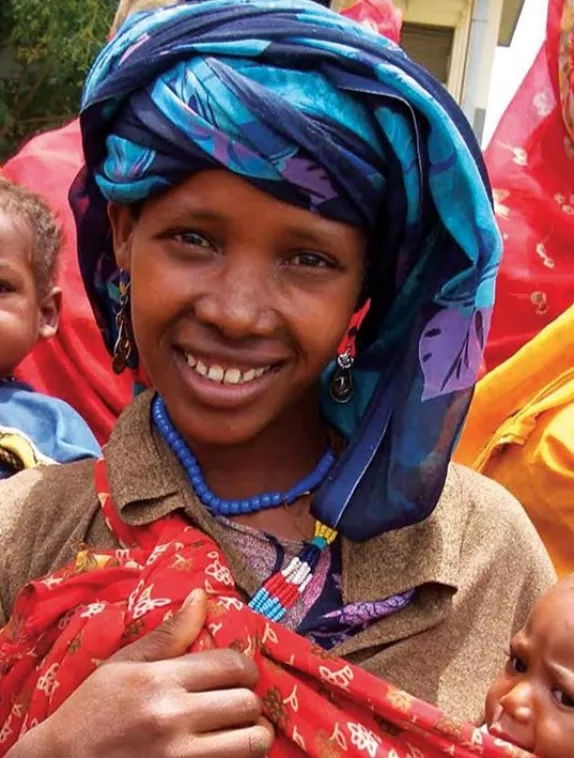 Front cover titled, "Special 40th issue: focus on Ethiopia." The image shows a group of Ethiopian mothers with their babies.