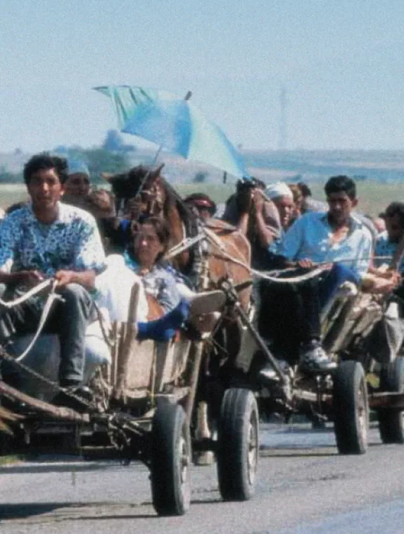 Front cover image shows people traveling by horse and cart 