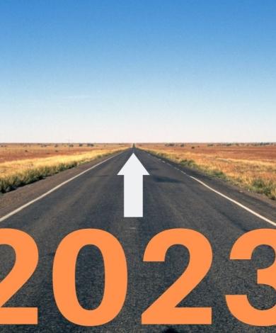An empty road with 2023 at the beginning and an arrow 