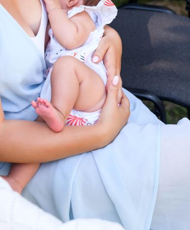 Woman breastfeeding, Ukraine