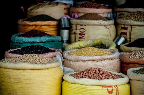 Beans and spices in sacks in a market