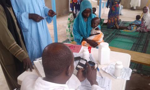 a health worker using the CMAM app in Ouaddai regian Chad