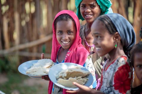 Girls in Ethiopia with their nutritious meals