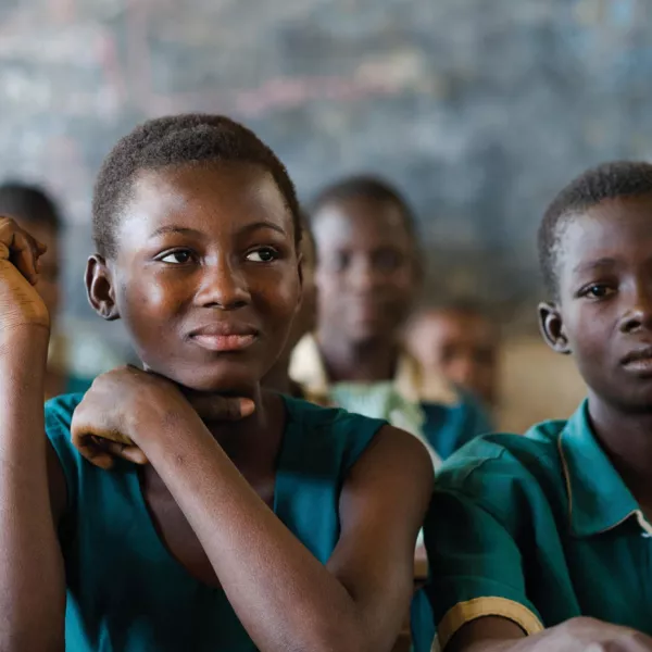 Front cover of report titled, "Adolescent Interest Group meeting 12th December 2017: Synthesis of evidence to date, key gaps and opportunities for adolescent nutrition." Image shows children in the classroom.