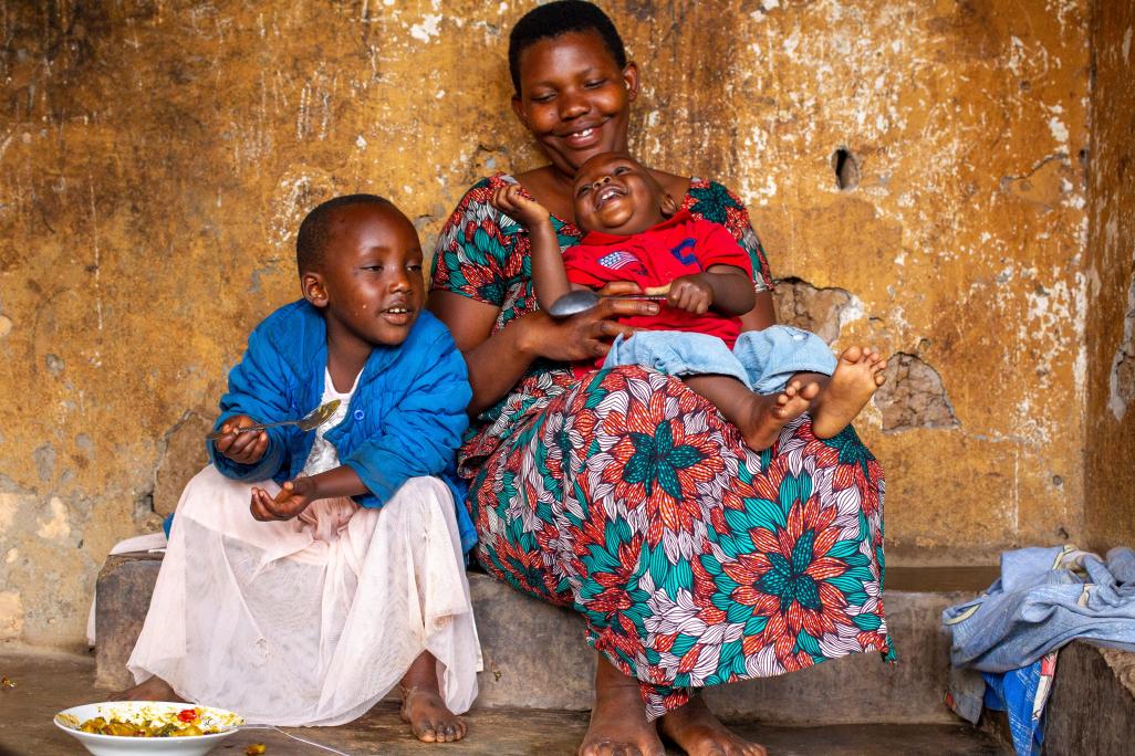 Merankebandi participant and her children. Burundi, 2021