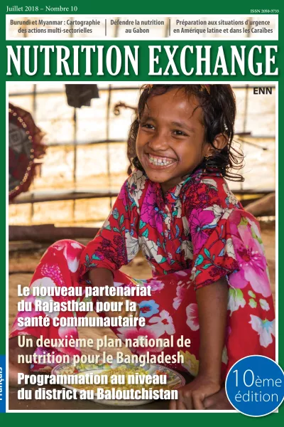 Front cover of Nutrition Exchange French version of issue 10. Image shows a young girl eating from bowl and smiling.
