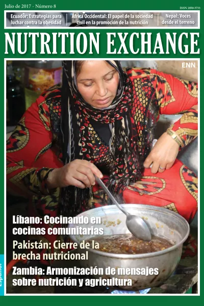 Front cover of Issue 8 Spanish version of Nutrition Exchange. Image shows a woman sitting down and cooking over a stove.