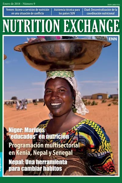 Front cover of Issue 9 Spanish version of Nutrition Exchange. The image shows a woman posed with a bowl filled with objects balanced on her head.