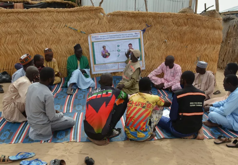 a group of men in northern Nigeria attending a father to father support group